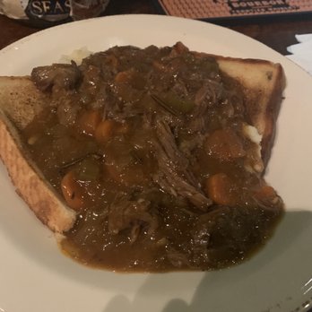 Christy's Euro Pub - Open faced pot roast sandwich - Pubs Near Me - Greenville, North Carolina