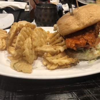 Walk-On's Sports Bistreaux - West Monroe Restaurant - Buffalo Chicken sandwich with fries, queso and moscow mule. - Cajun/Creole Near Me - West Monroe, Louisiana Walk-On's Sports Bistreaux - West Monroe Restaurant - Buffalo Chicken sandwich with fries, queso and moscow mule. - Cajun/Creole Near Me - West Monroe, Louisiana