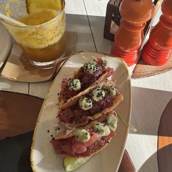 Monkeypod Kitchen - Tuna Poke Tacos appetizer. With a half cup of Mai Tai - Tacos Near Me - Honolulu, Hawaii