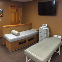 TruFit Chiropractic - Ultrasound/muscle stim and roller bed