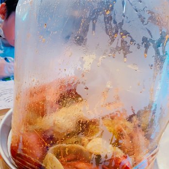 Crafty Crab - a plastic bag of food on a plate - Seafood Near Me - Raleigh, North Carolina Crafty Crab - a plastic bag of food on a plate - Seafood Near Me - Raleigh, North Carolina