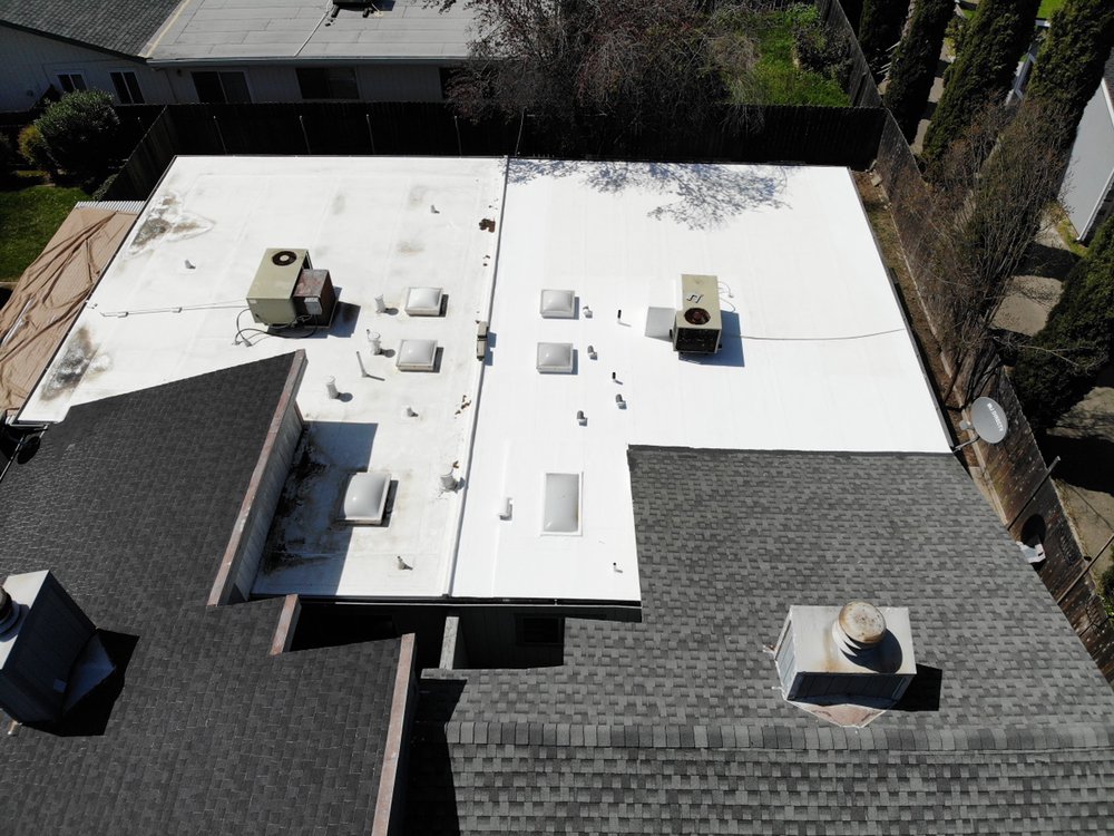 Slide of Flat Roof Pros