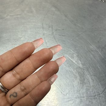 Tracy's Nail Spa - I've never experienced lent underneath my nails when getting them done when I asked if this is how it was going to be left, she said yes. - Nail Salons Near Me - El Monte, California