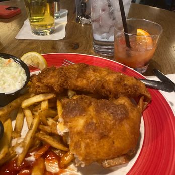 Rusty Bucket Restaurant and Tavern - Fish and chips dinner. Sorry, I ate a lot of fries before pic. Always a great pic. - American Near Me - Dublin, Ohio