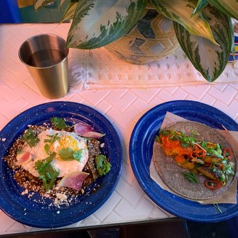 Nixta Taqueria - Daily Special on the left: Mole chilaquiles. Staple on the right: Butternut squash taco - Mexican Near Me - Austin, Texas Nixta Taqueria - Daily Special on the left: Mole chilaquiles. Staple on the right: Butternut squash taco - Mexican Near Me - Austin, Texas