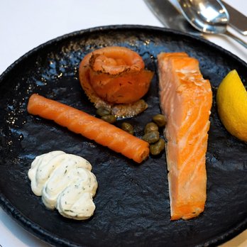 Peacock Alley - Trio of Scottish Salmon: hot smoked salmon, cold smoked salmon and gravlax, capers, dill crème fraiche, lemon. - British Near Me - Edinburgh, EDH