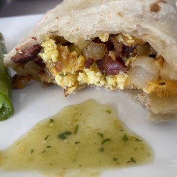 Mariachi's Mexican Food - New breakfast burrito with their green salsa and grilled jalapeño. (Bacon is a bit hard) but still good. - Mexican Near Me - Avondale, Arizona Mariachi's Mexican Food - New breakfast burrito with their green salsa and grilled jalapeño. (Bacon is a bit hard) but still good. - Mexican Near Me - Avondale, Arizona