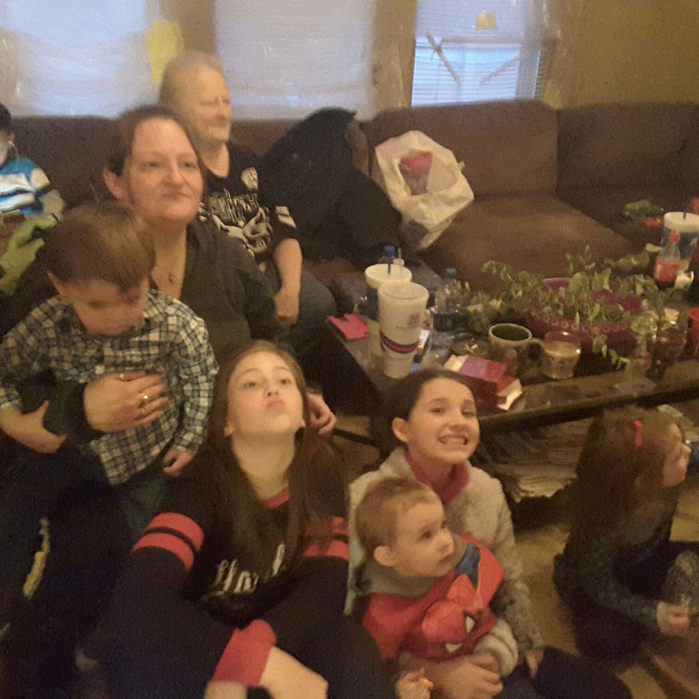 a group of people sitting on a couch