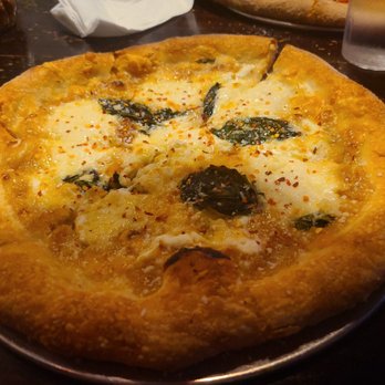 Johnny Rad's Pizzeria Tavern - El gato - Pizza Near Me - Baltimore, Maryland