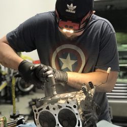 Holler Auto Subaru service and repair - Removing old gasket material from the intake ports- Head Gasket Repair