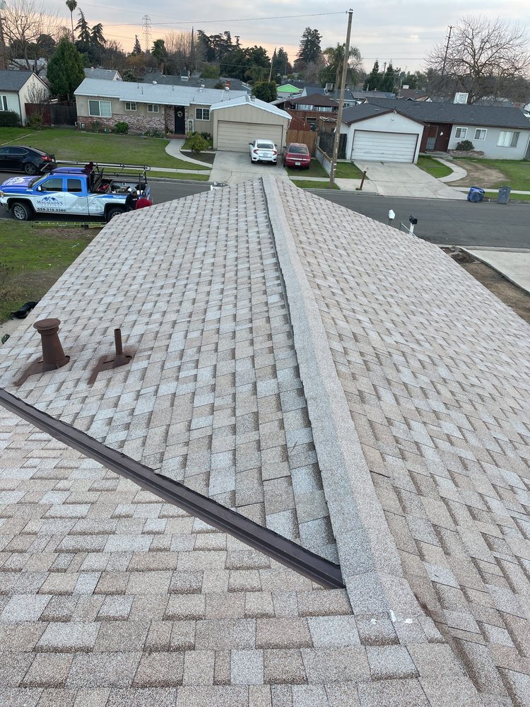 Slide of Magallon's Roofing