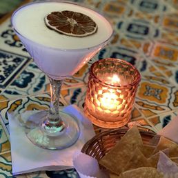 a glass of milk and a bowl of chips a glass of milk and a bowl of chips