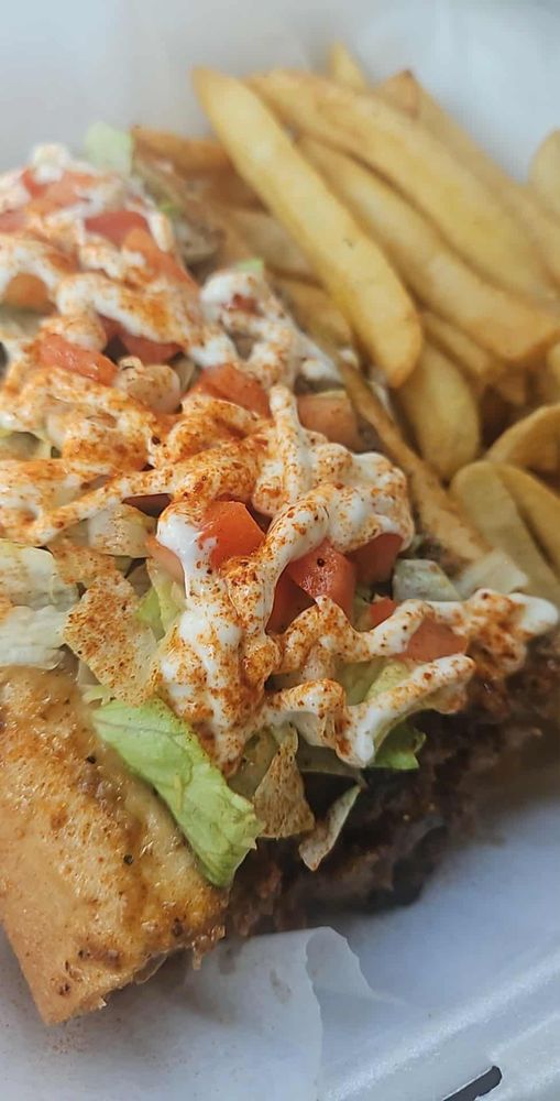 Uncle Phil's Cheesesteaks & Grill Logo