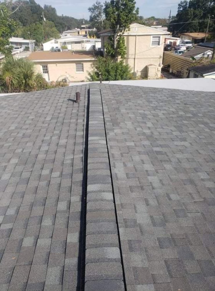 Slide of Longhorns Roofing