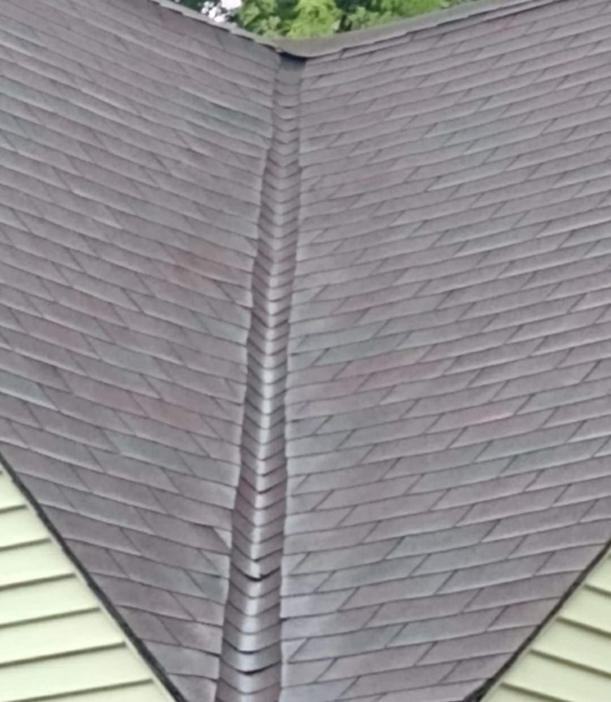 Slide of Acadiana Roofing