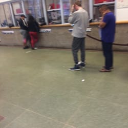 US Post Office - One person working.... So the line is by the door