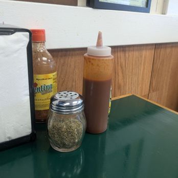 Taqueria El Gallo - Herbs and salsa, a nice touch. Also very clean in here. - Mexican Near Me - Pleasanton, California