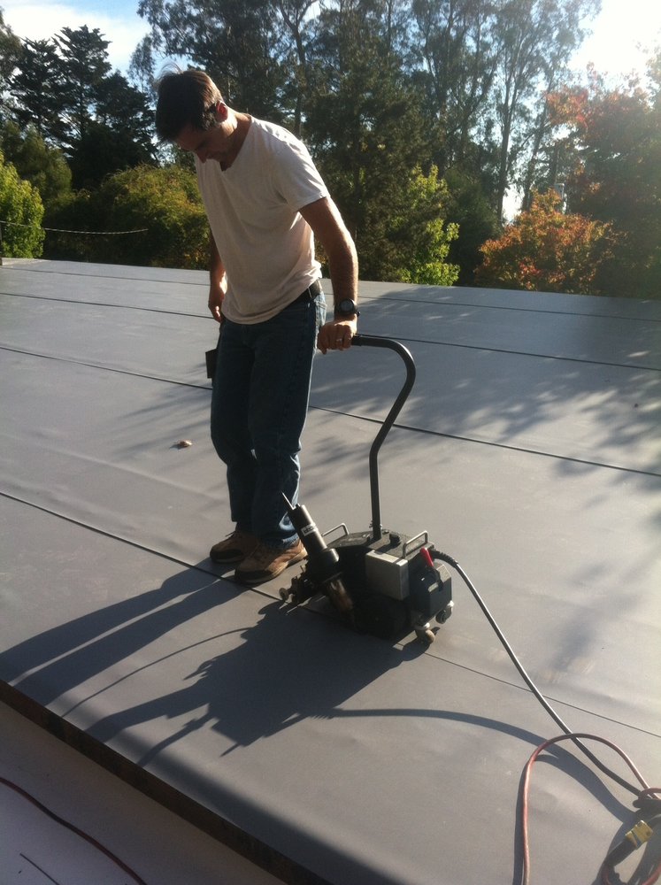 Slide of Integrity Roofing Systems