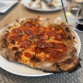 Wolfgang Puck Kitchen + Bar - Pepperoni pizza - New American Near Me - The Villages, Florida Wolfgang Puck Kitchen + Bar - Pepperoni pizza - New American Near Me - The Villages, Florida