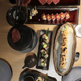 Janken - Top to bottom (LTR): A5 Wagyu Hot Stone, Spicy Tuna roll, Hamachi Crispy Rice, Dynamite roll, sides for A5 Wagyu - Japanese Near Me - Portland, Oregon