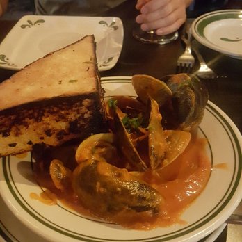 Vincenzo's Terrazza - Clams and mussels with tasty sauce topped with garlic bread - Italian Near Me - San Dimas, California Vincenzo's Terrazza - Clams and mussels with tasty sauce topped with garlic bread - Italian Near Me - San Dimas, California