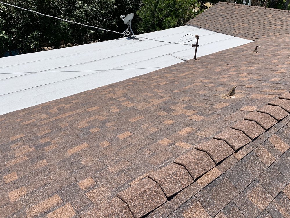 Slide of Rooster Roofing