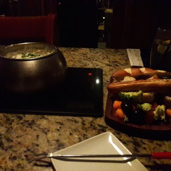 The Melting Pot - The Spinach Artichoke Cheese Fondue with the dipper plate. - Fondue Near Me - Glendale, Arizona The Melting Pot - The Spinach Artichoke Cheese Fondue with the dipper plate. - Fondue Near Me - Glendale, Arizona