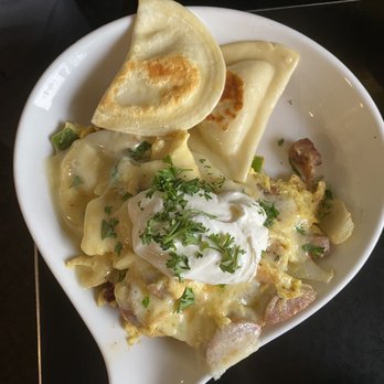 Cherie Inn - The special: Polish Sausage Scramble with Perogies - Breakfast & Brunch Near Me - Grand Rapids, Michigan Cherie Inn - The special: Polish Sausage Scramble with Perogies - Breakfast & Brunch Near Me - Grand Rapids, Michigan