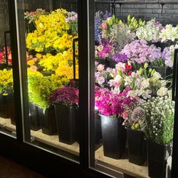 Flower Company of Racine - Check out our cooler stocked with fresh blooms!  Stop by and choose your favorites for any occasion. We can't wait to see you!