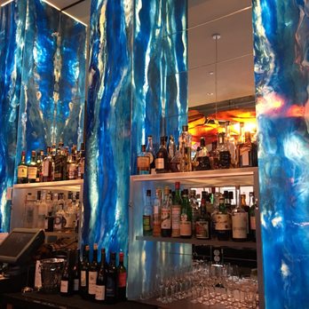 Glass Lounge - a bar with a lot of bottles of alcohol - Cocktail Bars Near Me - Portland, Maine Glass Lounge - a bar with a lot of bottles of alcohol - Cocktail Bars Near Me - Portland, Maine