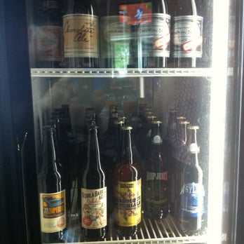 Barley's Kitchen + Tap - A cooler near the bar filled with bombers. - New American Near Me - Overland Park, Kansas Barley's Kitchen + Tap - A cooler near the bar filled with bombers. - New American Near Me - Overland Park, Kansas