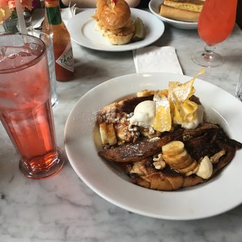 Stanley - Banana Fosters French Toast, Italian soda, and shrimp po boy - Breakfast & Brunch Near Me - New Orleans, Louisiana Stanley - Banana Fosters French Toast, Italian soda, and shrimp po boy - Breakfast & Brunch Near Me - New Orleans, Louisiana