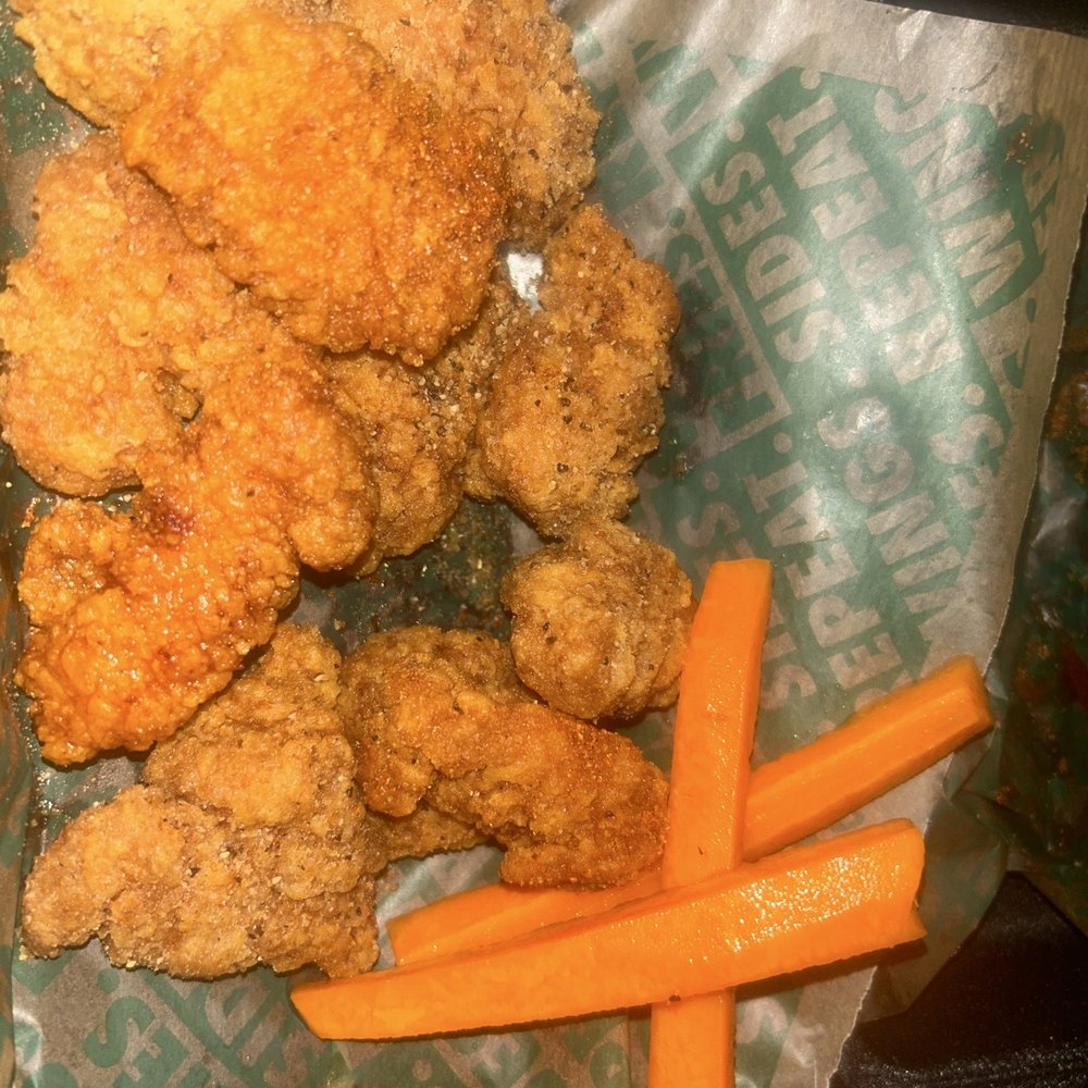Lemon pepper, dry rub and hot honey dry rub boneless with carrots on the side. Their voodoo fries are delicious also. Lemon pepper, dry rub and hot honey dry rub boneless with carrots on the side. Their voodoo fries are delicious also.