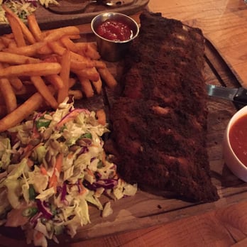Devil's Elbow Ale & Smoke House - Dry rubbed pork ribs with Yukon fries and smoked ketchup. He ribs came with a salsa esque sauce which was also tasty! - Gastropubs Near Me - Vancouver, British Columbia Devil's Elbow Ale & Smoke House - Dry rubbed pork ribs with Yukon fries and smoked ketchup. He ribs came with a salsa esque sauce which was also tasty! - Gastropubs Near Me - Vancouver, British Columbia