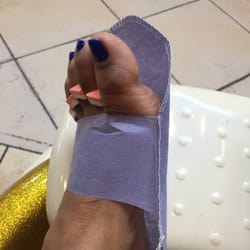 Nail 2000 - Just got a $28 pedicure. Should it look like this while I'm still at the salon?