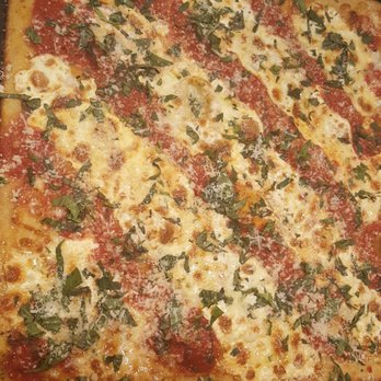 Paisanos Pizza - a square pizza with cheese and spinach - Pizza Near Me - Chesterfield, South Carolina Paisanos Pizza - a square pizza with cheese and spinach - Pizza Near Me - Chesterfield, South Carolina