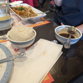 Hunan Gardens - White rice , brown sauce that comes with the roast duck. - Chinese Near Me - Kalamazoo, Michigan