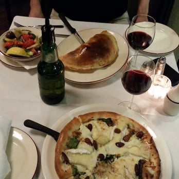 La Favorita - Calzone, Bella Pizza and red wine... Delicious. - Italian Near Me - Ottawa, Ontario La Favorita - Calzone, Bella Pizza and red wine... Delicious. - Italian Near Me - Ottawa, Ontario