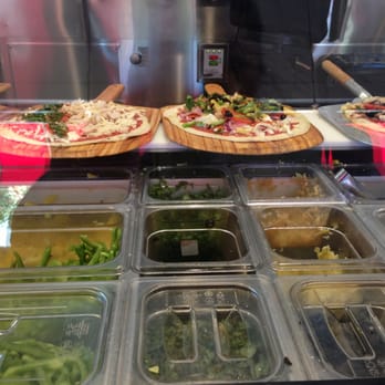 Pieology Pizzeria - Selecting our pizza toppings - Pizza Near Me - Walnut, California