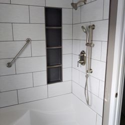 Radiant Plumbing - Final transformation from a typical tub shower to a custom tile shower rebuild