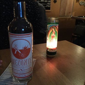 Overproof - Dining with repeat customers merited an extra "course":  Mezcal straight up, with the bottle left on our table.  Dangerous! - Cocktail Bars Near Me - San Francisco, California