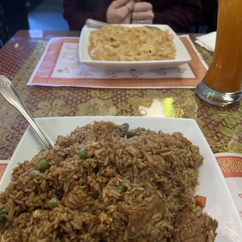 Bangkok Flavor - Beef fried rice (closest) and peanut butter curried noodles. - Thai Near Me - Kalamazoo, Michigan Bangkok Flavor - Beef fried rice (closest) and peanut butter curried noodles. - Thai Near Me - Kalamazoo, Michigan
