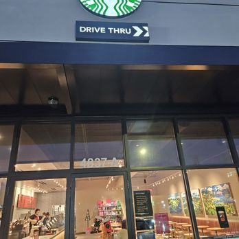 Starbucks - the front of a starbucks drive thru - Coffee & Tea Near Me - Locust Grove, Georgia Starbucks - the front of a starbucks drive thru - Coffee & Tea Near Me - Locust Grove, Georgia