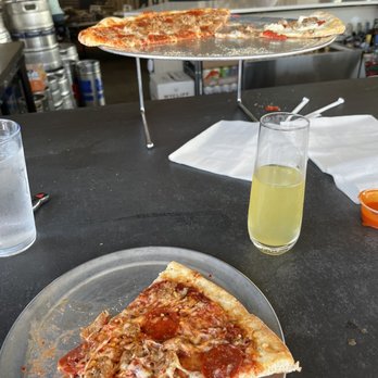 Pizza Bros - New Yorker Pizza and pineapple mimosa - Pizza Near Me - Chattanooga, Tennessee