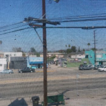 Venice Market - a view of a parking lot through a window - Grocery Near Me - Los Angeles, California Venice Market - a view of a parking lot through a window - Grocery Near Me - Los Angeles, California