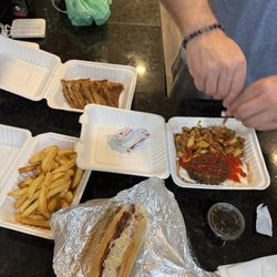 Marty's Delicatessen & Restaurant - Chicken salad sub w/ bacon, french fries, french toast and breakfast platter.