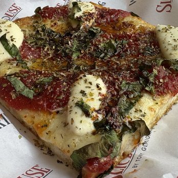 Slice House by Tony Gemignani - Sweet Gino slice (added dried herbs and hot pepper oil). - Pizza Near Me - Riverside, California Slice House by Tony Gemignani - Sweet Gino slice (added dried herbs and hot pepper oil). - Pizza Near Me - Riverside, California