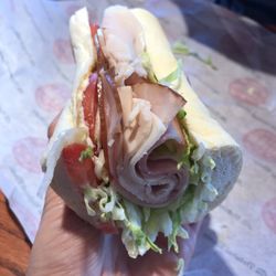 Half of a #11 Country Club sandwich