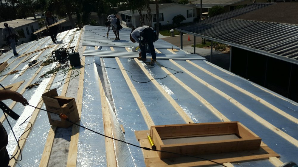 Slide of Luviano Roofing