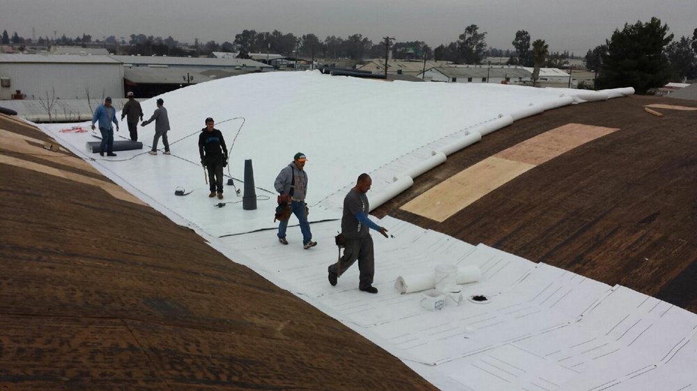 Slide of All Weather Roofing
